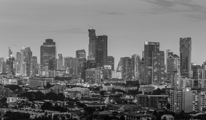 Black and White, City and office building with sunset sky background