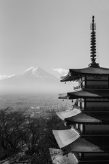 Black and White, Mt. Fuji aerial viewed from behind red Chureito Pagoda, in late winter, Japan