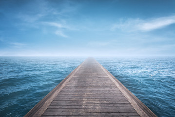 Wooden Pier on Blue Ocean