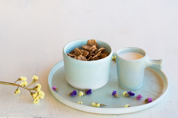 Whole grain cereals and milk for breakfast