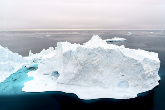 Icebergs are melting on arctic ocean in Greenland