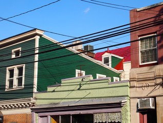 Colorful Rooftops And Power Lines Background