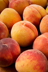 Fototapeta na wymiar Fresh sweet peaches close-up