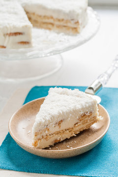 On a piece of coconut cake plate