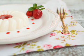 Dessert panna cotta with strawberry sauce