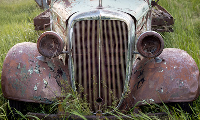 Fototapeta na wymiar Farm truck left to rust and rot