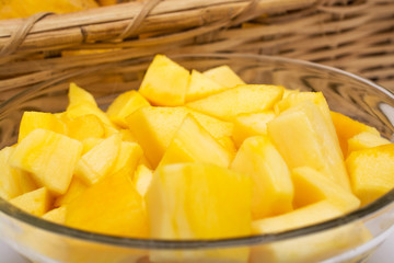 Fresh and juicy slice of mango in bowl