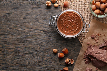 Background with hazelnut spread and ingredients