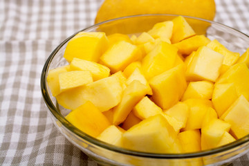 Fresh and juicy slice of mango in bowl