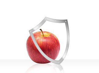 Apple with health protection shield Isolated on White