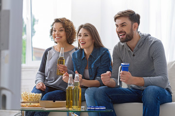 Fans of soccer watching match