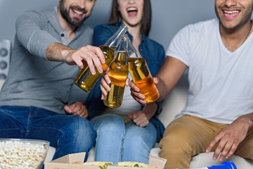 Group of friends watching sport together