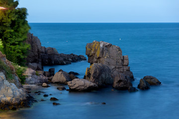 Fototapeta na wymiar Rock in the water of the coastline of Sozopol town, Burgas Region, Bulgaria