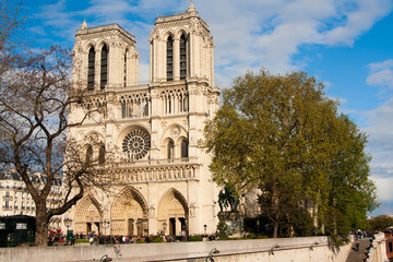 Fototapeta na wymiar Notre Dame cathedral at late evening with beautiful clouds, Paris, France