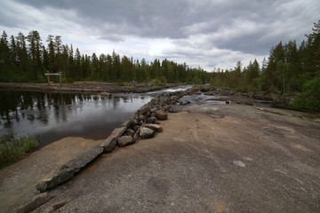 Swedish river in Haelsingland with rock ground