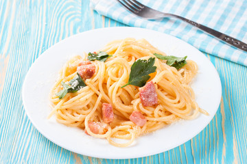 Pasta Carbonara in white plate.