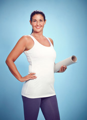 Naklejka premium Young Yoga Woman With Excercise Mat