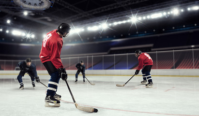 Fototapeta premium Hockey match at rink . Mixed media