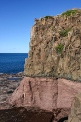 Coast and headland geological contact at Kiama, New South Wales, Australia.