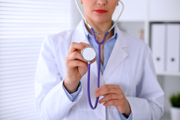 Doctor with a stethoscope in the hands