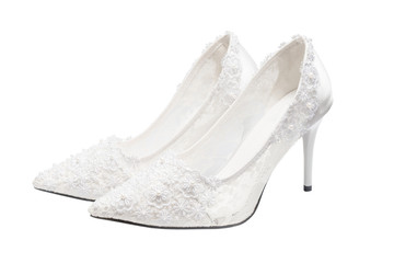 White bridal wedding shoes (footwear) isolated on white background. Clipping path inside. Handmade Lace decorates.