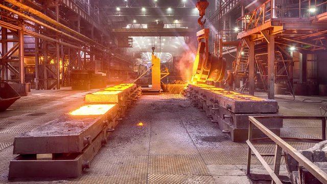 Workers on ferroalloy factory
