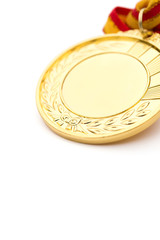gold medal on a white background close up vertical