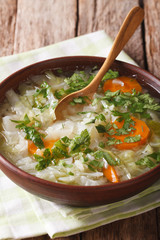Healthy fresh vegetable soup close up in a bowl. vertical
