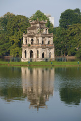 Tower Turtle with reflection closeup. Morning on the Hoan Kiem lake, Hanoi