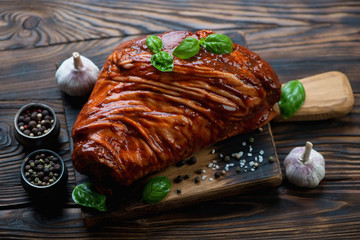 Raw seasoned pork knuckle ready for cooking, studio shot