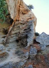 strongly weathered rock / rocky landscape of the island of Lindos, Greece