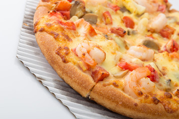 Hot piece of pizza with melted cheese