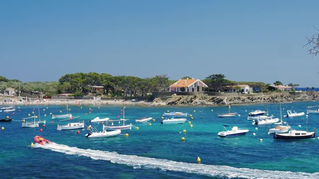The picturesque sea bay with yachts and boats. The popular Spanish resort town of Cadaques