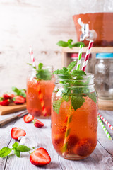 Homemade delicious strawberry compote in glass jar