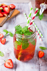 Homemade delicious strawberry compote in glass jar