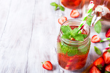 Homemade delicious strawberry compote in glass jar