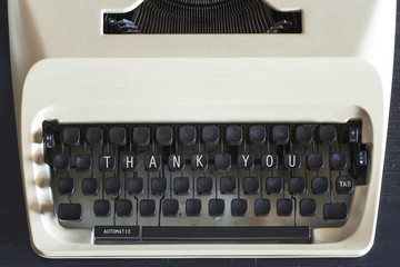 Thank You message written on vintage typewriter keys