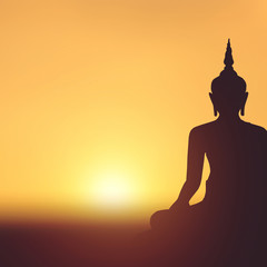 Silhouette la statue de bouddha sur fond de coucher de soleil