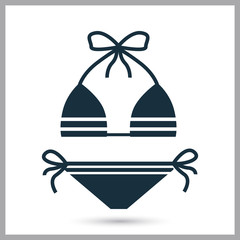 Female swimsuite icon on the background