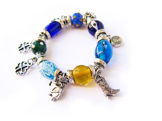Beads and gems bracelet isolated in white