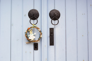 Wooden door with wreath