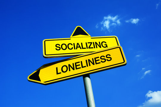 Socializing vs Loneliness - Traffic sign with two options - social interaction of sociable people though gatherings and meetings vs loneliness of asocial and introvert person