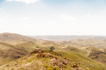 The parched rocky hills and sky summer day.