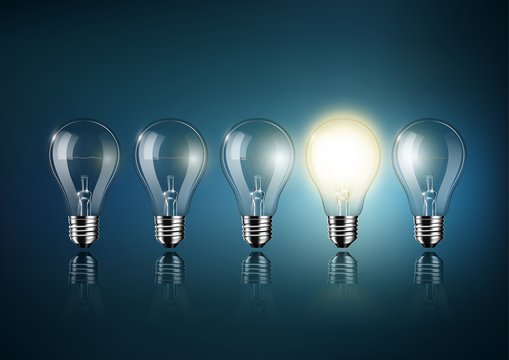 Glowing light bulb is among a lot of turned off light bulbs on dark blue background , concept idea , Transparent Vector
