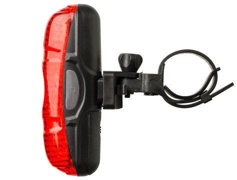 Red rear bicycle lamp with mount isolated.