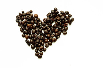 Roasted coffee bean as heart on white background