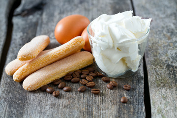 tiramisu ingredients on wooden surface
