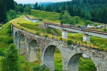 Fototapeta na wymiar Carpathian railway retro and modern bridges