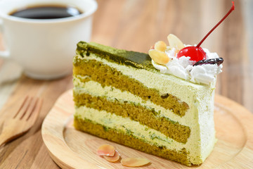green tea cake with a coffee cup