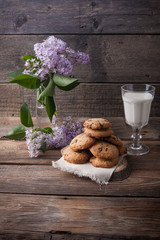 Stack of cookies with glass of milk